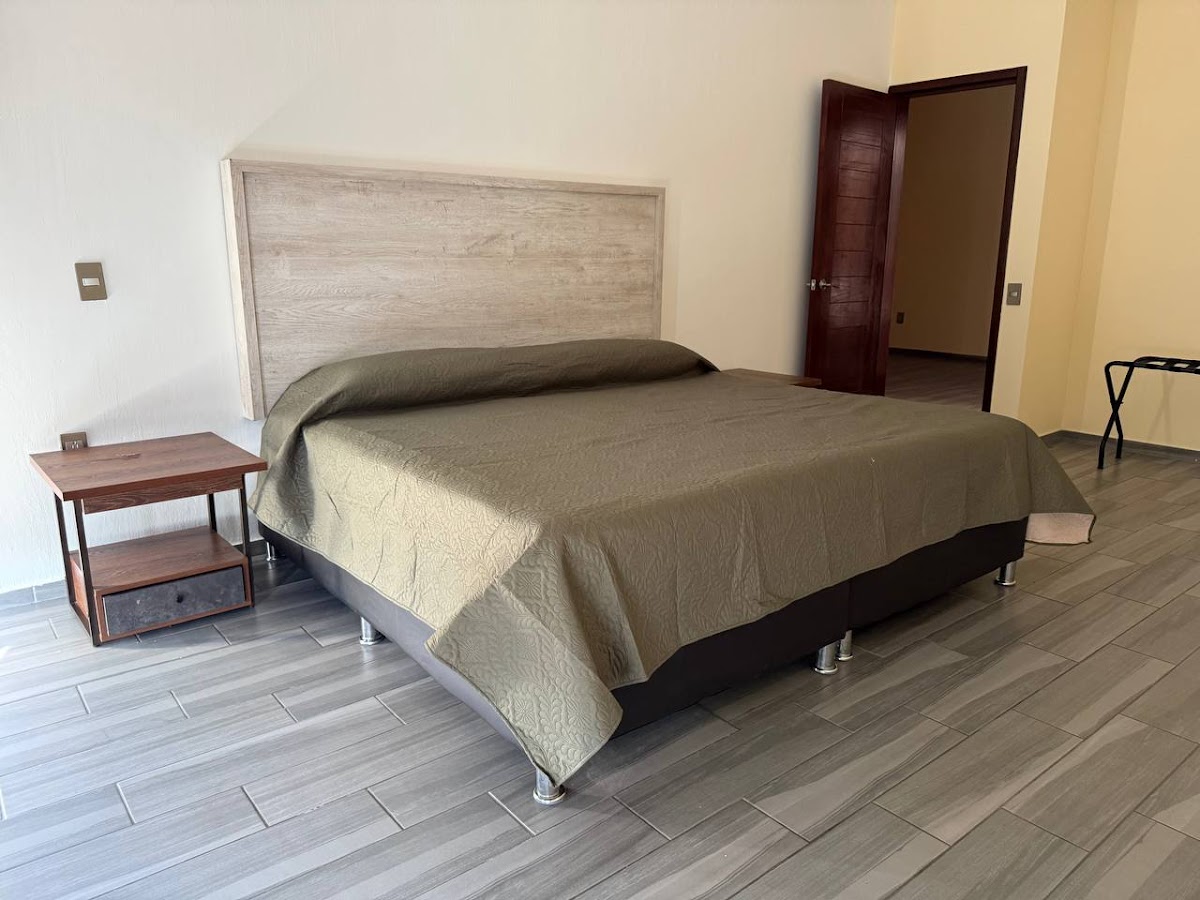 Hotel / Renta Airbnb - Casas y Suites HG