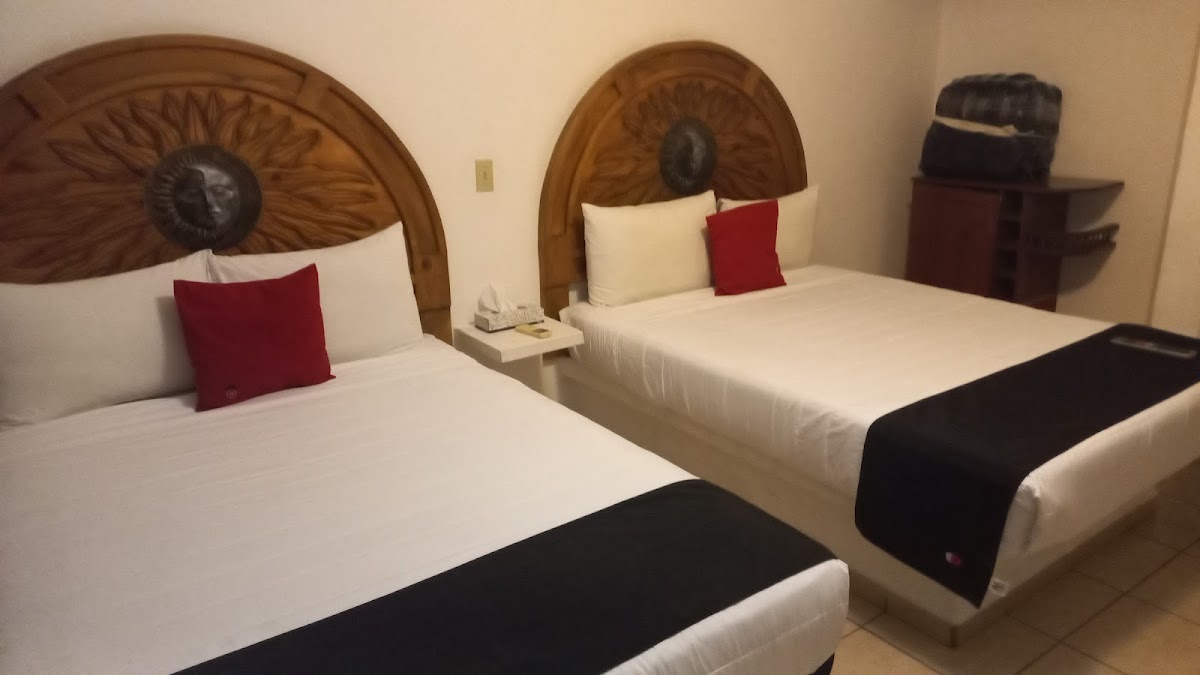Capital O Hotel J y M photo 2