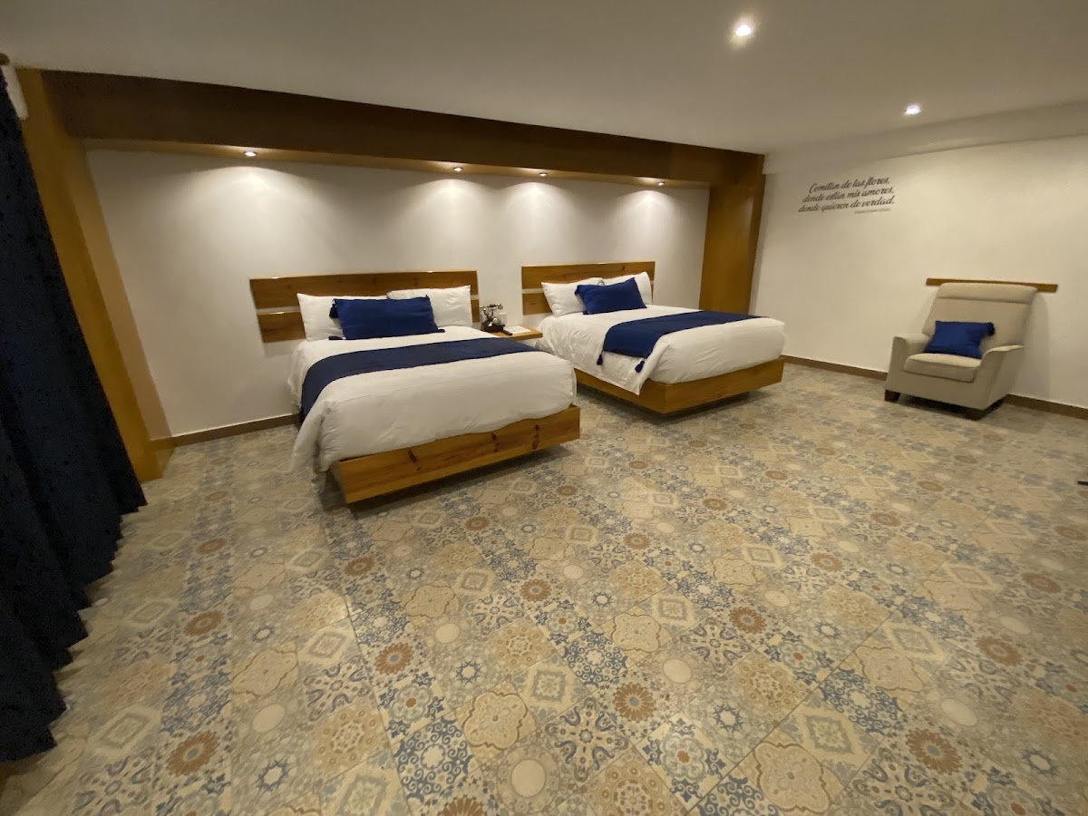 Capital O Hotel La Alborada photo 2